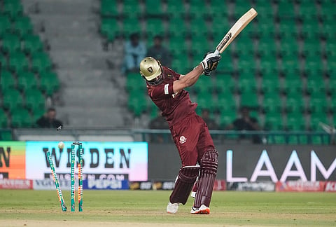 Hyderabad Kingsmen Hammad Azam is bowled out by Lahore Qalandars' Ubaid Shah during the opening cricket match of the Pakistan Super League between Lahore Qalandars and Hyderabad Kingsmen, which taking place without spectators, in Lahore, Pakistan.