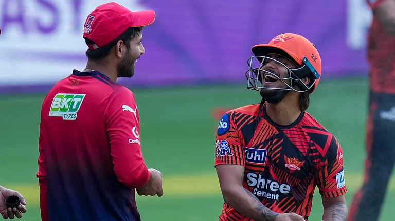 SunRisers Hyderabad's captain Ishan Kishan, right, with Royal Challengers Bengaluru's Jitesh Sharma during a practice session on the eve of their Indian Premier League 2026 match at M Chinnaswamy Stadium in Bengaluru. - PTI/Shailendra Bhojak