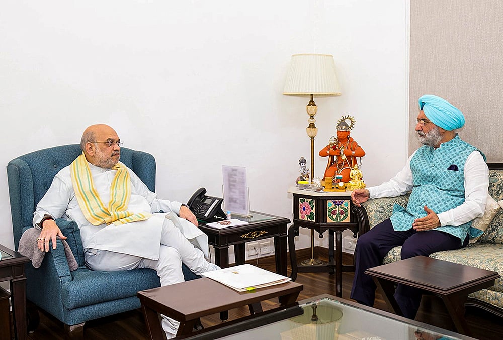 Amit Shah meets Taranjit Singh Sandhu