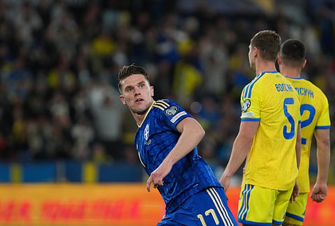 Sweden's Viktor Gyokeres celebrates after scoring his side's second goal during a World Cup playoff semifinal soccer match between Ukraine and Sweden in Valencia, Spain.