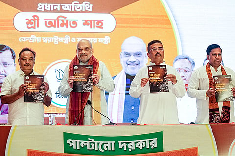 Union Home Minister Amit Shah releases a 'charge sheet' against the TMC government, in Kolkata, West Bengal. LoP in the West Bengal Assembly Suvendu Adhikari, MoS Sukanta Majumdar, and state party president Samik Bhattacharya are also seen. 