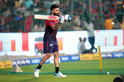 Royal Challengers Bengaluru's Virat Kohli practices in the nets before the start of the Indian Premier League cricket match between Royal Challengers Bengaluru and Sunrisers Hyderabad in Bengaluru, India.