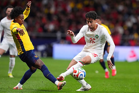 Ecuador's Angelo Preciado, left, and Morocco's Annas Sallaheddine fight for the balla7[ during a friendly soccer match between Morocco and Ecuador in Madrid, Spain.