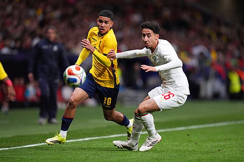 Ecuador's Kendry Paez, left, and Morocco's Annas Sallaheddine fight for the ball during a friendly soccer match between Morocco and Ecuador in Madrid, Spain.