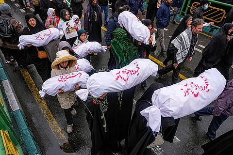Tehran Al Quds Day Rally Iranian people hold symbolic child-sized coffins during the Al-Quds Jerusalem Day rally in support of Palestinians on the last Friday of Muslims holy month of Ramadan in Tehran.
