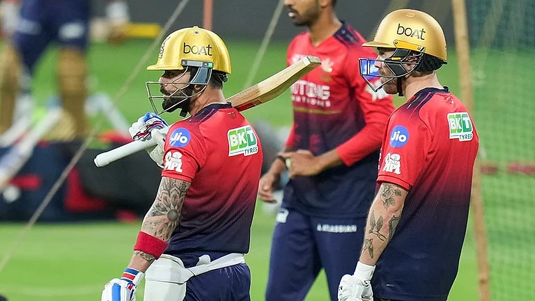 Royal Challengers Bengaluru’s Virat Kohli, left, and Phil Salt, right, during a practice session ahead of the Indian Premier League (IPL) 2026 cricket match against Sunrisers Hyderabad, at M. Chinnaswamy Stadium in Bengaluru. - | Photo: PTI/Shailendra Bhojak