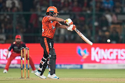 Sunrisers Hyderabad's captain Ishan Kishan plays a shot during the Indian Premier League cricket match between Royal Challengers Bengaluru and Sunrisers Hyderabad in Bengaluru, India.