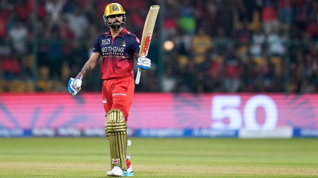 Royal Challengers Bengaluru's Virat Kohli celebrates his fifty runs during their Indian Premier League match against Sunrisers Hyderabad in Bengaluru. - AP