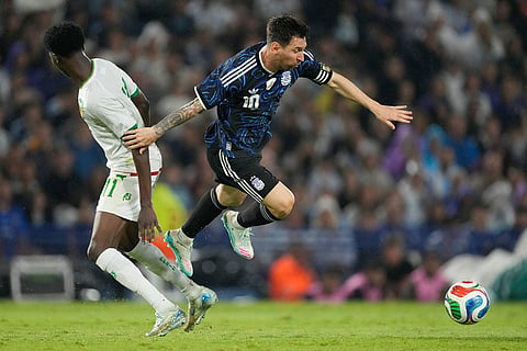 Argentina's Lione Mesi dribbles during a friendly soccer match against Mauritania in Buenos Aires, Argentina.