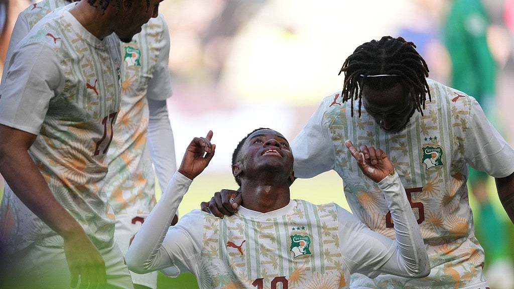 Ivory Coast's Simon Adingra, centre, celebrates scoring his side's second goal during the international friendly match against South Korea in Milton Keynes, England. - Photo: AP