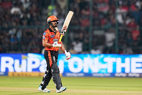 Sunrisers Hyderabad's captain Ishan Kishan celebrates his fifty runs during the Indian Premier League cricket match between Royal Challengers Bengaluru and Sunrisers Hyderabad in Bengaluru, India.