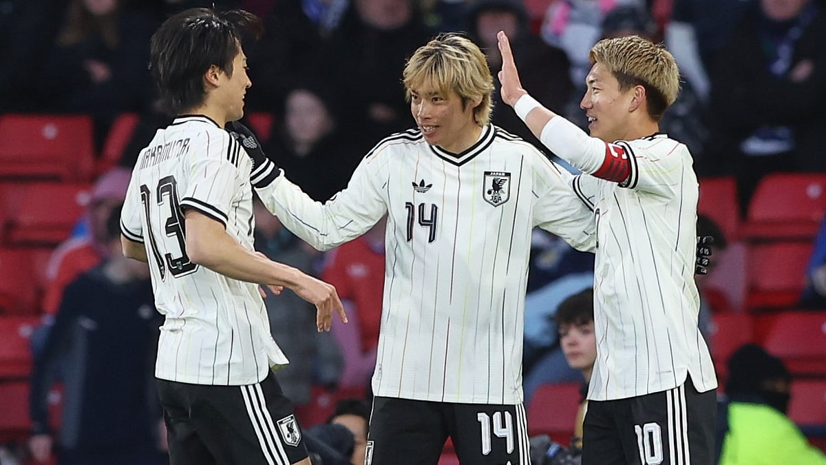 Japan's Junya Ito, centre, celebrates with Japan's Keito Nakamura, left, and Japan's Ritsu Doan after scoring his side's opening goal during the international friendly soccer match between Scotland and Japan in Glasgow, Scotland, Saturday, March 28, 2026. - | Photo: AP/Scott Heppell