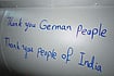 | Photo Courtesy: X/Iraninmumbai : Message of Gratitude: A handwritten ‘thank you’ note pasted on an Iranian missile 