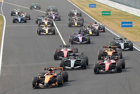 McLaren driver Oscar Piastri of Australia leads the field at the start of the Japanese Formula One Grand Prix at Suzuka in central Japan.