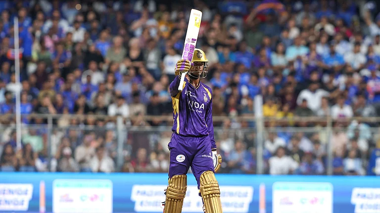 Angkrish Raghuvanshi celebrates his half-century against Mumbai Indians in IPL 2026 clash at the Wankhede Stadium in Mumbai. - ipl/X