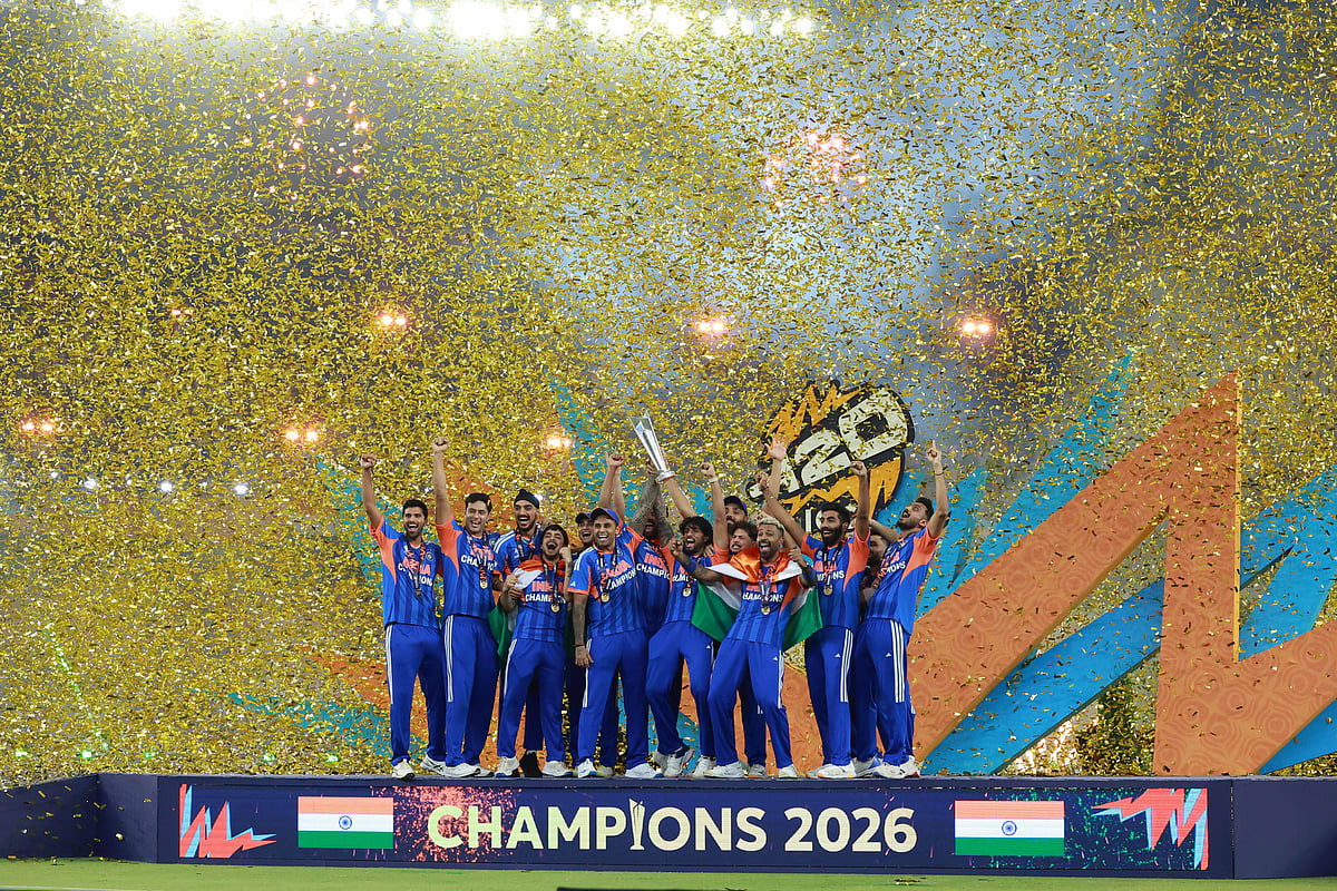Ahmedabad, Gujarat, India (IND): The Champions Indian team receives the Trophy during Finals of ICC Men s T20 World Cup 2026 between India and New Zealand at Narendra Modi Stadium, Ahmedabad, Gujarat, India on 8 March 2026. 