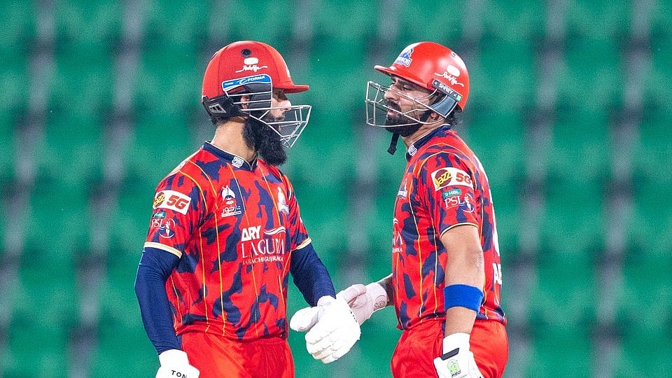 Karachi Kings players in action against Lahore Qalandars in PSL 2026 at Lahore.  - thepslt20/X