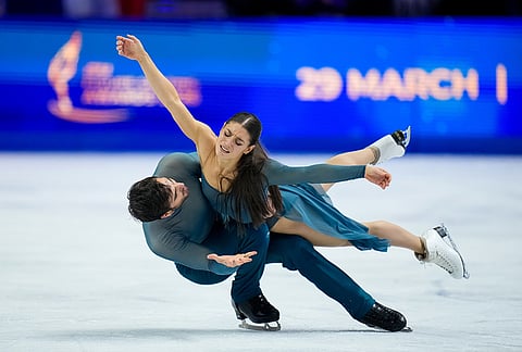 Laurence Fournier Beaudry and Guillaume Cizeron from France compete during the ice dance free dance at the Figure Skating World Championships in Prague, Czech Republic.