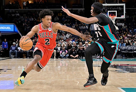 Chicago Bulls guard Collin Sexton (2) drives against Memphis Grizzlies forward Adama Bal (72) in the first half of an NBA basketball game in Memphis, Tennessee.