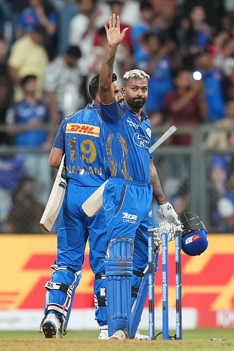 Mumbai Indians' captain Hardik Pandya celebrates after won the match during the Indian Premier League cricket match between Mumbai Indians and Kolkata Knight Riders in Mumbai.