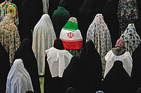 Un-necessary War: Why A Proud Iranian Nation Has Not Capitulated | Photo: AP : Call to Prayer: Iranian worshippers perform Eid al-Fitr prayers in Tehran on March 21, 2026