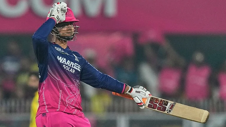 Rajasthan Royals' Vaibhav Sooryavanshi celebrates his fifty runs during the Indian Premier League cricket match between Chennai Super Kings and Rajasthan Royals in Guwahati. - | Photo: AP/Anupam Nath