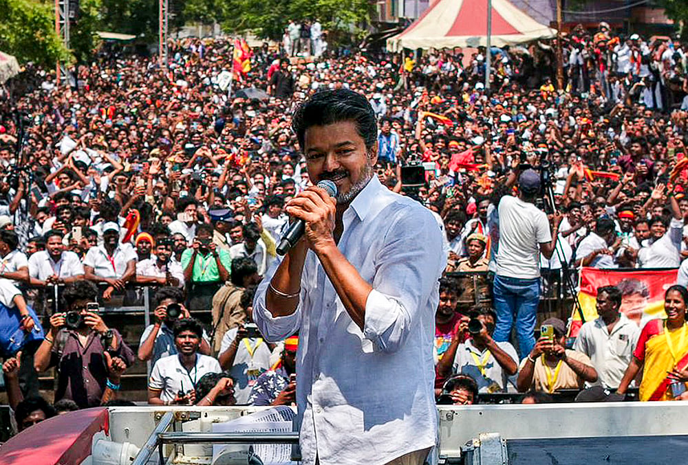 | Photo: Handout via PTI  : Tamilaga Vettri Kazhagam (TVK) chief and actor Vijay campaigns after filing his nomination papers for the Tamil Nadu Assembly elections from the Perambur constituency, in Chennai. 
