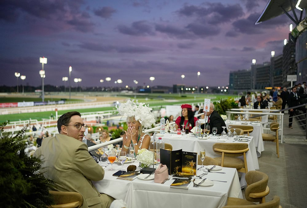 Glamour at the Dubai World Cup horse race but thinner crowds due to Iran war-Racegoers
