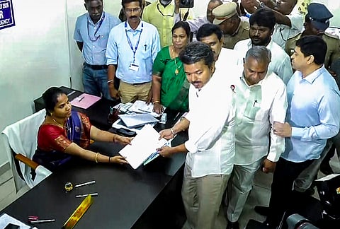 Tamilaga Vettri Kazhagam (TVK) leader and actor Vijay files his nomination papers for the April 23 Tamil Nadu Assembly elections from the Perambur constituency, at a filing centre, in Chennai.