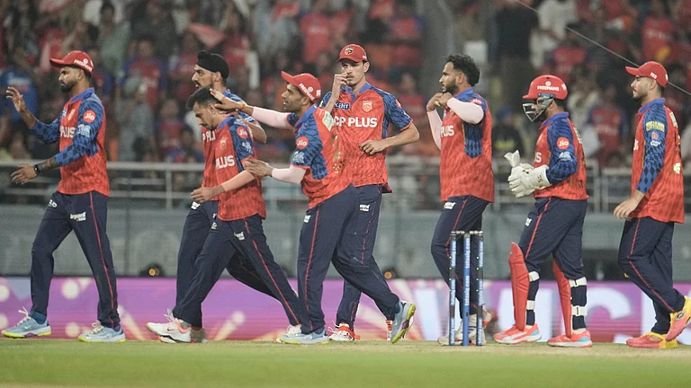 Punjab Kings' Yuzvendra Chahal , second from left, celebrates with teammates the wicket of Gujarat Titans' captain Shubman Gill during the Indian Premier League cricket match between Gujarat Titans and Punjab Kings in New Chandigarh, India, Tuesday, March 31, 2026 - AP Photo
