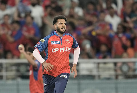 Punjab Kings' Vyshak Vijaykumar celebrates the wicket of Gujarat Titans' M Shahrukh Khan during the Indian Premier League cricket match between Gujarat Titans and Punjab Kings in New Chandigarh.