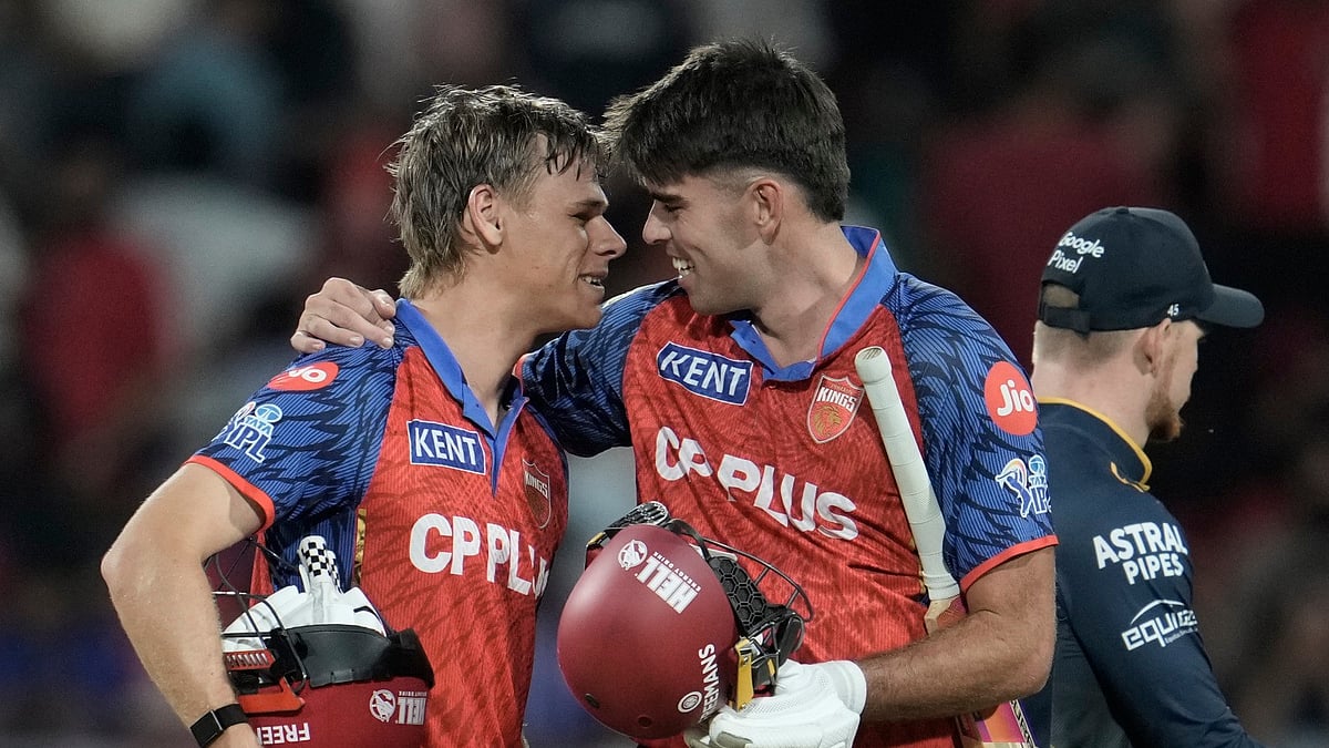 Punjab Kings' Cooper Connolly, left, and Xavier Bartlett celebrates the win against Gujarat Titans during the Indian Premier League cricket match in New Chandigarh, India, Tuesday, March 31, 2026 - AP Photo