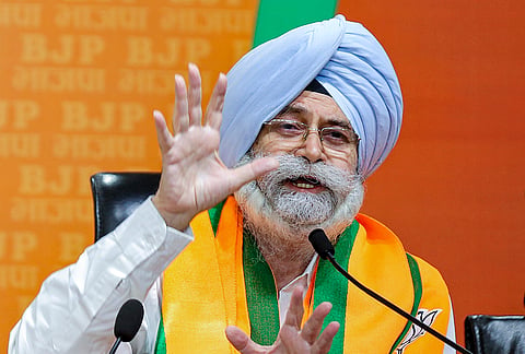 Senior Supreme Court advocate HS Phoolka addresses after joining the BJP, at the party headquarters, in New Delhi.