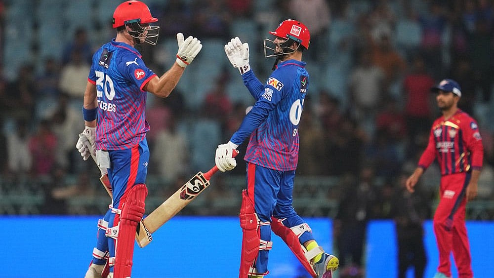 | Photo: AP/Manish Swarup : Delhi Capitals' Tristan Stubbs, left, and batting partner Sameer Rizvi celebrate their win in the Indian Premier League cricket match against Lucknow Super Giants in Lucknow, India.