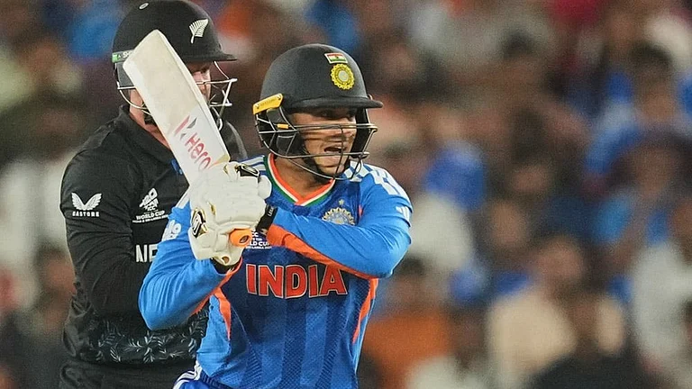 India's Abhishek Sharma reacts after hitting a shot during the T20 World Cup cricket final match between India and New Zealand in Ahmedabad. - | Photo: AP/Rafiq Maqbool