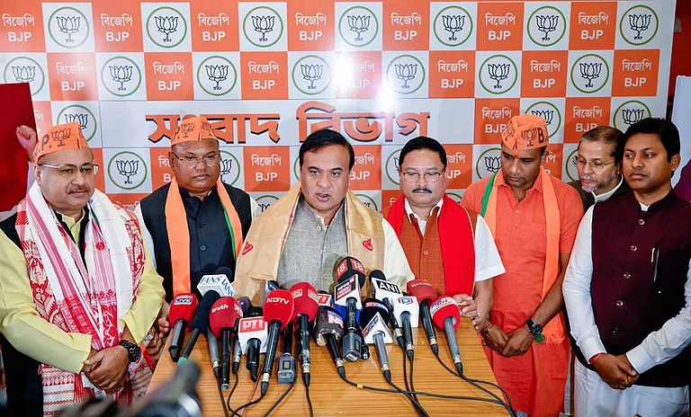 Assam Chief Minister Himanta Biswa Sarma speaks during a press conference on the joining of three Congress MLAs to BJP at state party office, in Guwahati recently. - ANI News
