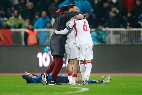 Turkey's players celebrate after winning the World Cup qualifying playoff final soccer match between Kosovo and Turkey in Pristina, Kosovo, Tuesday, March 31, 2026