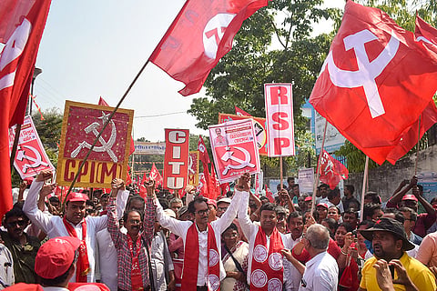 Left Front supporters take part in an election campaign in support of their candidates ahead of the West Bengal Assembly Election, at Balurghat, in Dakshin Dinajpur district.