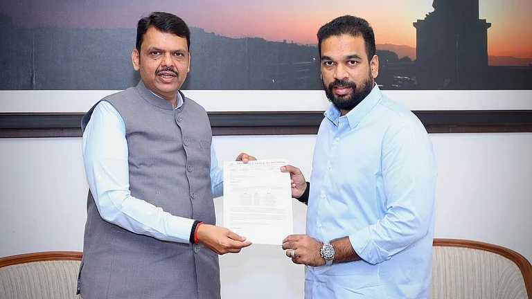 Mumbai Cricket Association president Ajinkya Naik (right) meets Maharashtra chief minister Devendra Fadnavis. - Special Arrangement