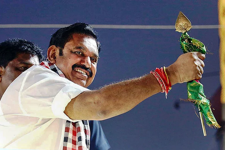 Leader of Opposition in the Tamil Nadu Assembly and AIADMK chief Edappadi K Palaniswami during a roadshow ahead of the state Assembly election, in Sivaganga. - Photo: PTI