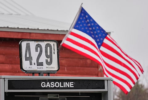 A sign shows the price of gas at a store, Tuesday, March 31, 2026, in Freeport, Maine.