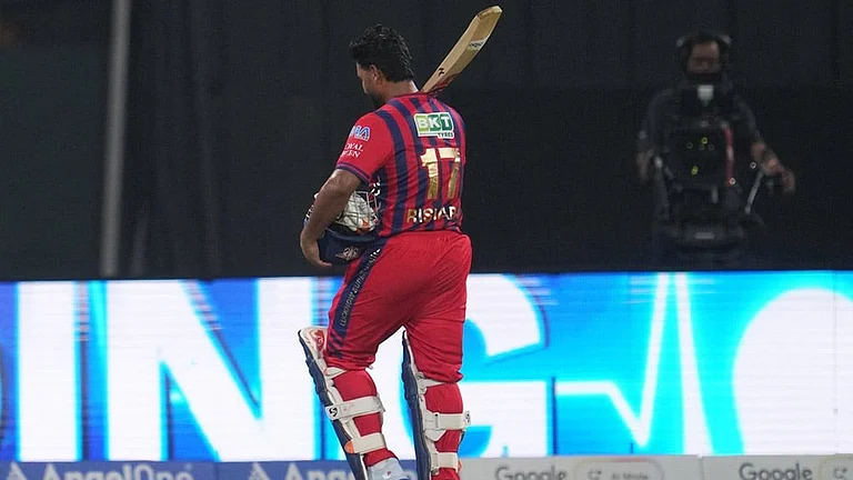 Lucknow Super Giants' captain Rishabh Pant walks off the field after losing his wicket during the Indian Premier League cricket match between Lucknow Super Giants and Delhi Capitals in Lucknow, India. - | Photo: AP/Manish Swarup