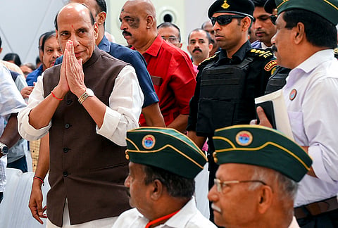 Defence Minister Rajnath Singh greets upon his arrival at a ceremony honouring war veterans and their families, in Thiruvananthapuram, Kerala.
