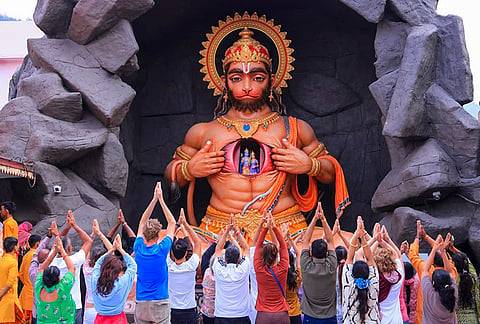 People offer prayers to Lord Hanuman on the occasion of the 'Hanuman Jayanti' festival, at Parmarth Niketan Ashram, in Rishikesh, Uttarakhand.