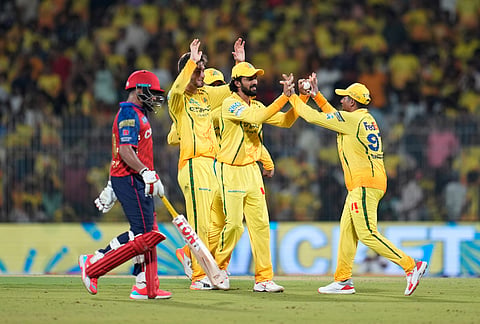 Chennai Super Kings' captain Ruturaj Gaikwad, center, celebrates the run out of Punjab Kings' Prabhsimran Singh, left, with teammates during the Indian Premier League cricket match between Chennai Super Kings and Punjab Kings in Chennai.
