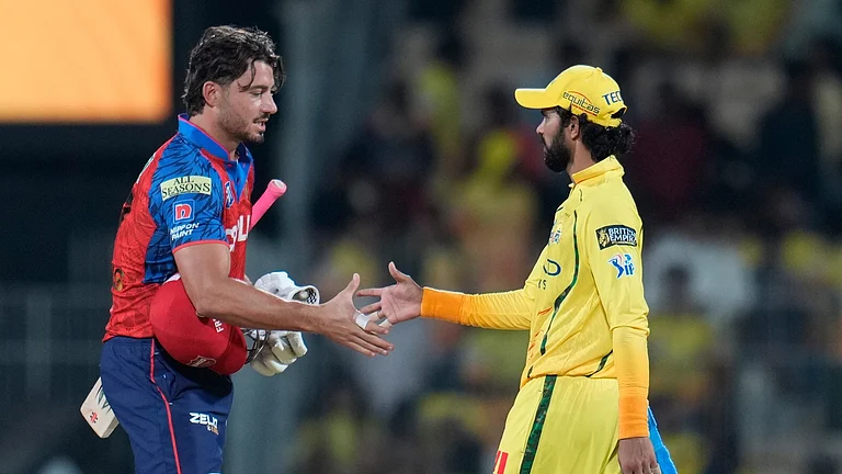 Punjab Kings' Marcus Stoinis shakes hand with Chennai Super Kings' captain Ruturaj Gaikwad after wining the Indian Premier League cricket against Chennai Super Kings and Punjab Kings in Chennai, India, Friday, April 3, 2026. - AP Photo