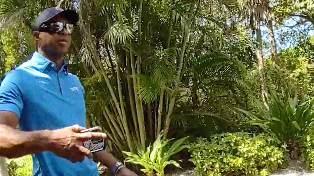 In this image from police body camera video released by the Martin County, Fla., Sheriff's Office, golfer Tiger Woods speaks on his cellphone following a car crash in Jupiter Island, Fla., Friday, March 27, 2026. 
 - Martin County Sheriff's Office via AP