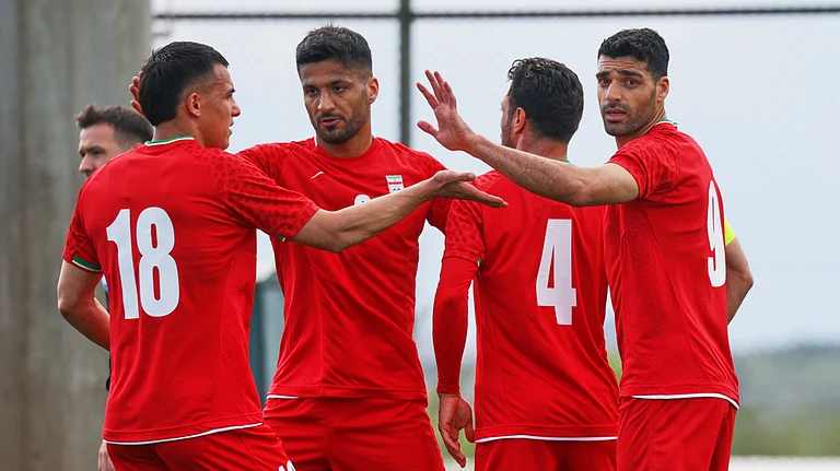 Iran's Mehdi Taremi, right, celebrates with teammates after scoring their side's second goal during a friendly soccer match between Iran and Costa Rica, in Antalya, southern Turkey, Tuesday, March 31, 2026. - (AP Photo/Riza Ozel)