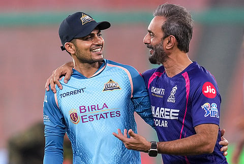 Gujarat Titans' captain Shubman Gill, left, and Rajasthan Royals' batting coach Vikram Rathour during a practice session ahead of an Indian Premier League (IPL) 2026 T20 cricket match between Gujarat Titans and Rajasthan Royals, in Ahmedabad, Gujarat.