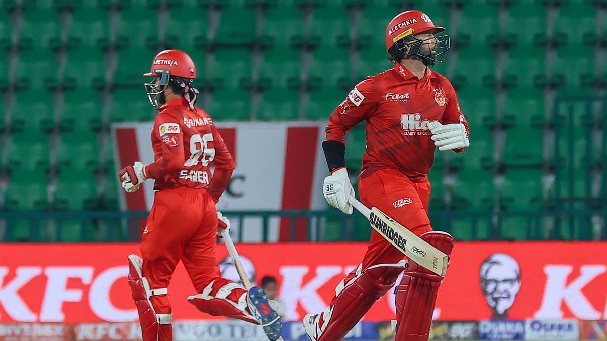 Sameer Minhas and Devon Conway in action for Rawalpindiz during PSL 2026 clash against Islamabad United at Gaddafi Stadium in Lahore. - null